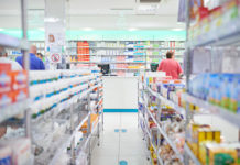 An aisle in a pharmacy. 