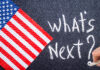 What's next on the chalk board and US flag